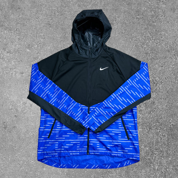 The Nike therma reflective jacket in the blue colourway is an exclusive activewear jacket. You wont find this jacket in most sportswear stores!