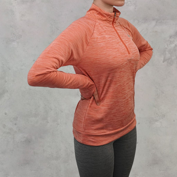 The Nike element half zip in the peach colourway is an elite half zip, and perfect for running.