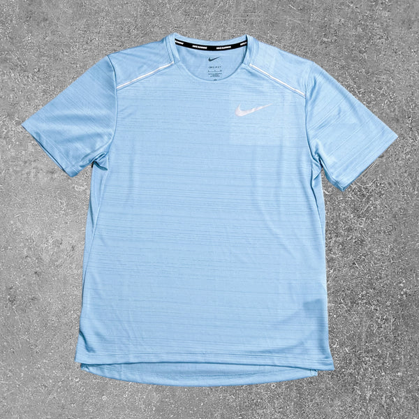 This Nike miler 1.0 worn blue T-Shirt is a premium piece of activewear.