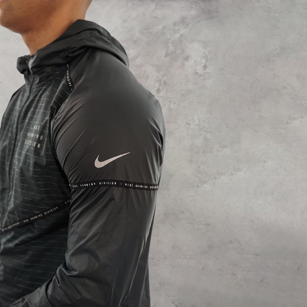 The nike running divsion storm fit reflective tracksuit in black is a premium piece of nike clothing.