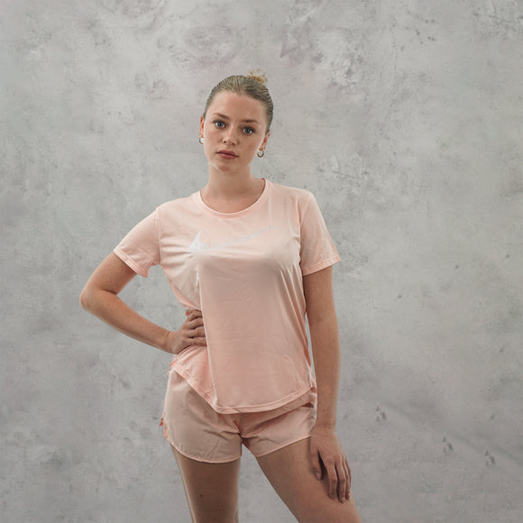 The nike swoosh run set in light pink is a great all round sportswear set.