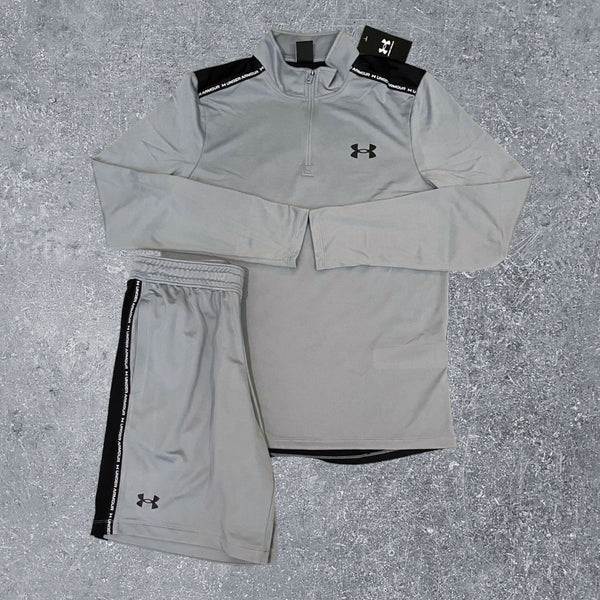 The UA heatgear 1/4 zip set in grey is a perfect gym set.