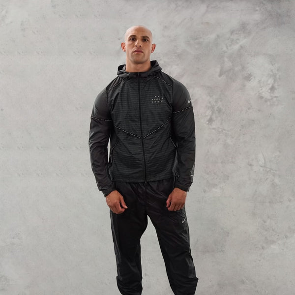 The nike running divsion storm fit reflective tracksuit in black is a premium piece of nike clothing.