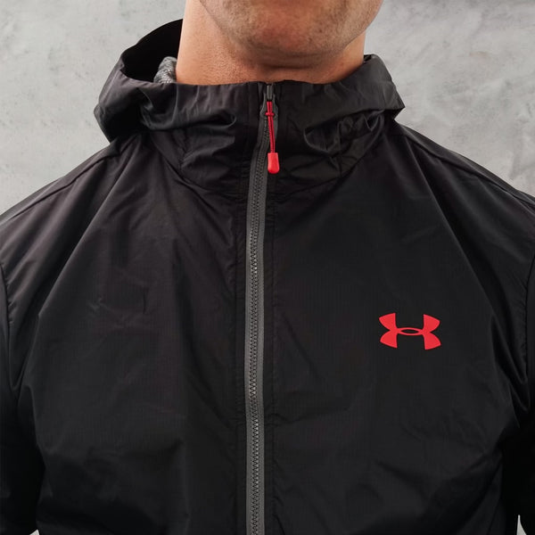 UA rain jacket in black is a high quality coat that is commonly used for running.