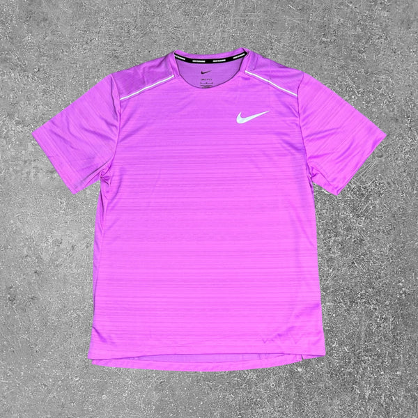 This nike miler 1.0 T-Shirt in a rush fuschia colourway is an exclusive sportswear T-shirt.