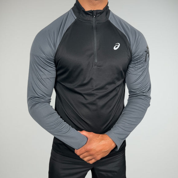 The ASICS Icon half zip keeps you cool and comfortable during your workouts or any event.